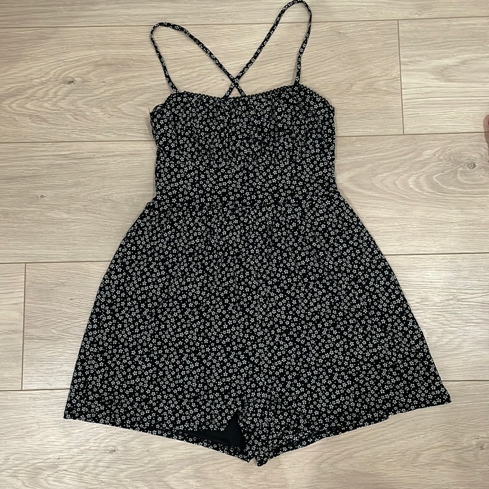 NWOT. Floral romper. Black and white. Size small.